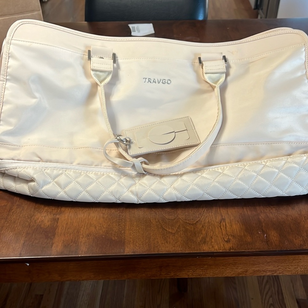Spacious Travgo bag with 12 pockets and usb port for charging electronics.